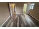 Comfortable bedroom with wood-look flooring, and a closet at 910 S Walden St # 101, Aurora, CO 80017