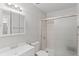 Full bathroom featuring a single sink vanity and tiled shower with glass door at 1289 S Wheeling Way, Aurora, CO 80012