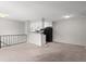 Open living area with a modern kitchen, seamlessly connecting living and dining spaces for comfortable living at 1289 S Wheeling Way, Aurora, CO 80012