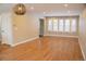 Spacious living room with hardwood floors and lots of natural light at 5877 S Fulton Way, Greenwood Village, CO 80111