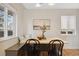 Cozy dining area with natural light and built-in bench seating, perfect for casual meals and gatherings at 2814 N Harrison St, Denver, CO 80205