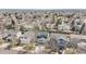 Aerial view of the neighborhood with houses, trees, and streets at 16328 E Phillips Ln, Englewood, CO 80112