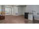 Finished basement area with carpet flooring, office space, and storage at 16328 E Phillips Ln, Englewood, CO 80112