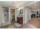 The bathroom features a shower, toilet, vanity, and tile flooring at 16328 E Phillips Ln, Englewood, CO 80112