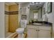 Stylish bathroom with tiled shower, elegant vanity, and well-placed decor for a touch of sophistication at 4302 Nepal St, Denver, CO 80249