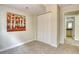 Functional bedroom with ample closet space and easy access to the adjacent bathroom at 4302 Nepal St, Denver, CO 80249
