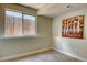 Comfortable bedroom featuring neutral carpeting and a window providing natural light at 4302 Nepal St, Denver, CO 80249