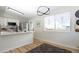 Modern kitchen features stainless appliances, sleek countertops, and bright, natural light, perfect for culinary enthusiasts at 4302 Nepal St, Denver, CO 80249