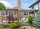 Inviting backyard deck with lush landscaping, patio furniture, and a cozy outdoor space at 4425 Irving St, Denver, CO 80211