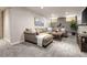 Spacious living room with a sectional sofa, comfortable seating, and ample space for relaxation at 4425 Irving St, Denver, CO 80211