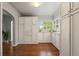Well-organized pantry offering ample storage space and natural light from the window at 4425 Irving St, Denver, CO 80211