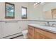 Bathroom with a pedestal sink, toilet and shower at 5635 E 17Th Avenue Pkwy, Denver, CO 80220