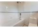 Substantial bathroom with a bathtub and toilet at 5635 E 17Th Avenue Pkwy, Denver, CO 80220