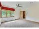 Bedroom with built-in shelving and window at 5635 E 17Th Avenue Pkwy, Denver, CO 80220