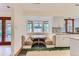 Kitchen breakfast nook with built in seating and backyard view at 5635 E 17Th Avenue Pkwy, Denver, CO 80220