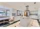 Modern kitchen with island and breakfast nook at 5635 E 17Th Avenue Pkwy, Denver, CO 80220