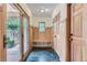 Mudroom with built-in bench, storage, and exterior access at 5635 E 17Th Avenue Pkwy, Denver, CO 80220