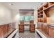 Home office with built-in wooden cabinetry at 5635 E 17Th Avenue Pkwy, Denver, CO 80220