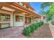 Outdoor patio features flagstone and mature shrubs at 5635 E 17Th Avenue Pkwy, Denver, CO 80220