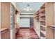 Large walk-in closet with ample shelving and hanging space at 5635 E 17Th Avenue Pkwy, Denver, CO 80220