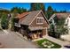 This house is a beautiful two-story home with attractive landscaping and a welcoming front porch at 302 N Main St, Breckenridge, CO 80424