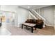 Inviting living room area with a comfortable couch and seamless flow into the kitchen at 1927 S Peoria St, Aurora, CO 80014