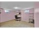 Finished basement area with neutral carpeting, offering ample space for recreation or storage at 13624 Omega Cir, Lone Tree, CO 80124