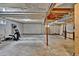 Open unfinished basement with utility connections, ready for customization and storage at 13624 Omega Cir, Lone Tree, CO 80124