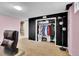 Finished basement with closet and view to the mechanical area at 13624 Omega Cir, Lone Tree, CO 80124