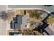 Birds-eye view of a home showcasing the roof, surrounding landscaping, and neighborhood layout at 7118 W Elmhurst Ave, Littleton, CO 80128