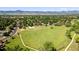 Panoramic aerial showcasing neighborhood with walking trails and mountain views at 7118 W Elmhurst Ave, Littleton, CO 80128