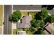Birds-eye view of the home's roof, landscaping, and proximity to the neighborhood at 7118 W Elmhurst Ave, Littleton, CO 80128