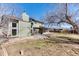 Expansive backyard with a stone patio, perfect for outdoor entertaining at 7118 W Elmhurst Ave, Littleton, CO 80128