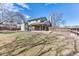Spacious backyard featuring a well-manicured lawn and patio area perfect for relaxation or outdoor gatherings at 7118 W Elmhurst Ave, Littleton, CO 80128