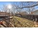 Backyard with grass and wooden fence at 10174 Spotted Owl Ave, Highlands Ranch, CO 80129