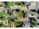 Expansive aerial view showcases the property's lush landscaping, garden, RV parking and generous lot size at 2151 Burbank St, Berthoud, CO 80513