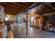 Unfinished basement with exposed ceiling, concrete floor, and potential for customization at 2151 Burbank St, Berthoud, CO 80513