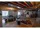 Spacious unfinished basement featuring exposed beams, storage, and room for personalization at 2151 Burbank St, Berthoud, CO 80513