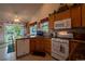 Bright eat-in kitchen featuring a breakfast nook with sliding doors to the backyard at 2151 Burbank St, Berthoud, CO 80513