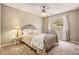 Bedroom with a window and comfortable bed, perfect for relaxation at 7655 S Ogden Way, Centennial, CO 80122