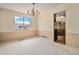 A dining room area with neutral colored walls and carpet at 7655 S Ogden Way, Centennial, CO 80122