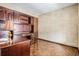 Home office featuring a built-in desk and shelving at 7655 S Ogden Way, Centennial, CO 80122