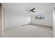 Spacious bedroom features neutral carpet, ample natural light, and a modern ceiling fan at 1002 Zang St, Golden, CO 80401