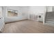 Bright living room features new floors, and fresh paint creating a move-in-ready space at 1002 Zang St, Golden, CO 80401