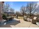 Spacious backyard patio with outdoor dining set and lounge area great for entertaining at 23101 Timber Spring Ln, Parker, CO 80138