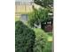 Backyard with a deer appearing between bushes near a wooden fence at 23101 Timber Spring Ln, Parker, CO 80138