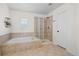 Bright bathroom featuring a soaking tub with tile surround and glass shower with tiled walls at 23101 Timber Spring Ln, Parker, CO 80138