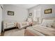 Cozy bedroom with two twin beds, complemented by a vintage dresser and soft lighting at 23101 Timber Spring Ln, Parker, CO 80138