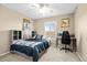 Bedroom with a bed, built-in bookshelf headboard, and a window with blinds at 23101 Timber Spring Ln, Parker, CO 80138