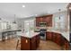 Open kitchen featuring stainless steel appliances and a center island with seating at 23101 Timber Spring Ln, Parker, CO 80138